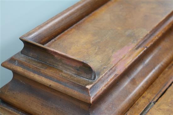 A late Victorian walnut davenport W.56cm